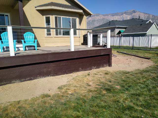 Farr West Trex Deck Rocky Harbor Main with Woodland Brown Picture Frame and Fascia to ground